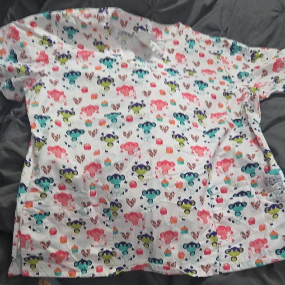 Uniform Advantage Scrub Top with Colorful Animal Print Worn Once.